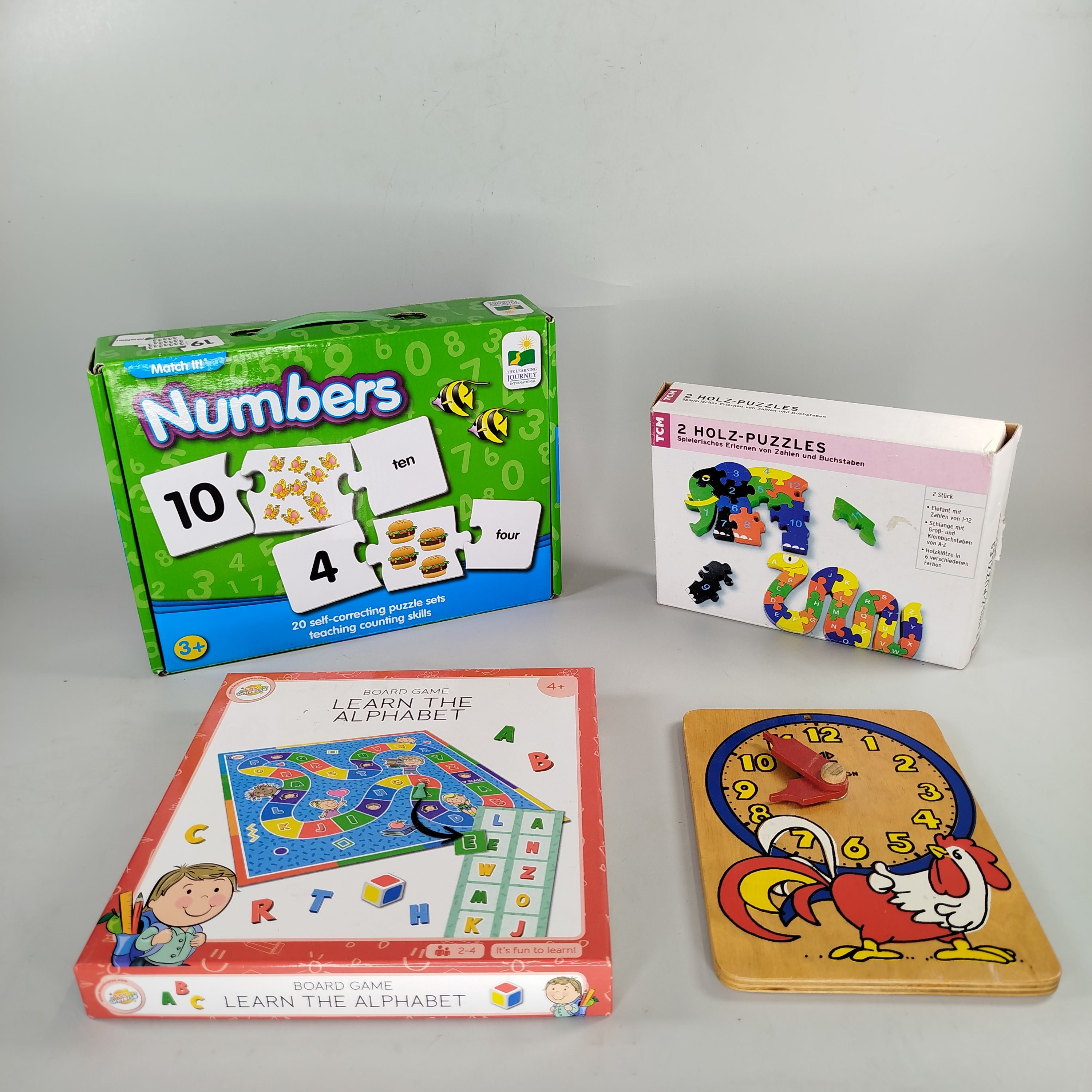 Diverse Lernspiel-Set: Zahlen, Buchstaben & Uhrzeit